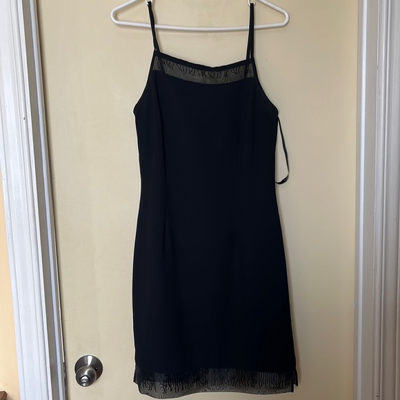 Size 8 designer dress by Joseph Ribkoff. - Picture 1 of 4